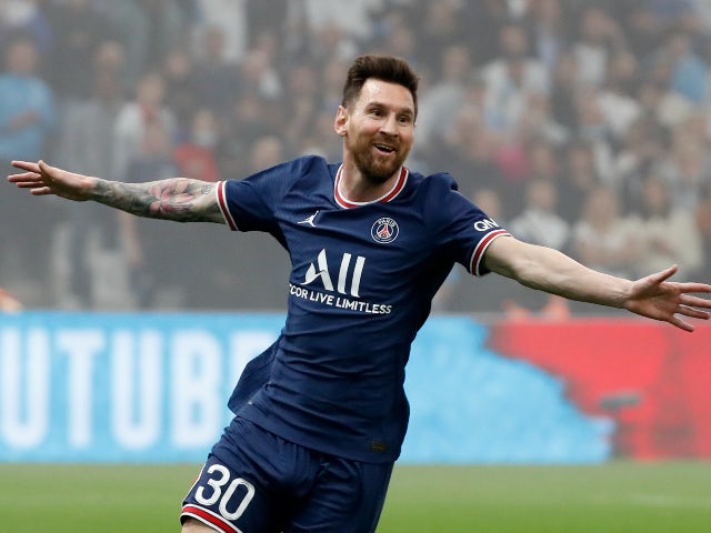 Paris St Germain's Lionel Messi celebrates after Olympique de Marseille's Luan Peres scores an own goal which is later disallowed on October 24, 2021