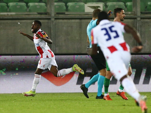 Red Star Belgrade's Guelor Kanga celebrates scoring their first goal on September 30, 2021