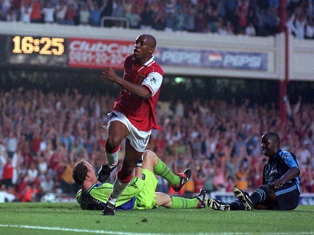 Ian Wright celebrates scoring for Arsenal in 1997