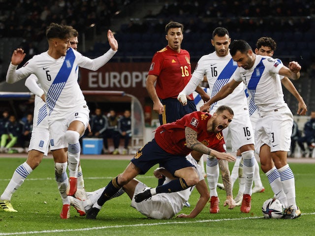 Spain's Inigo Martinez wins a penalty against Greece on November 11, 2021