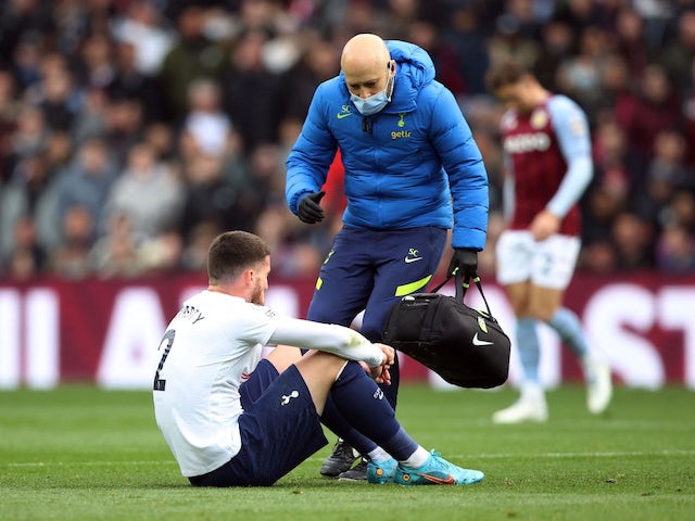 Tottenham Hotspur's Matt Doherty receives medical attention after sustaining an injury on April 9, 2022
