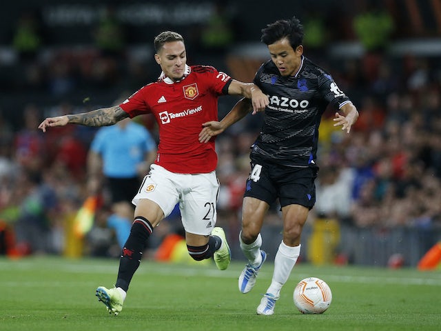 Manchester United's Antony in action with Real Sociedad's Takefusa Kubo on September 8, 2022