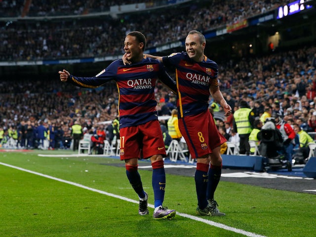 Neymar and Andres Iniesta in action for Barcelona in 2015