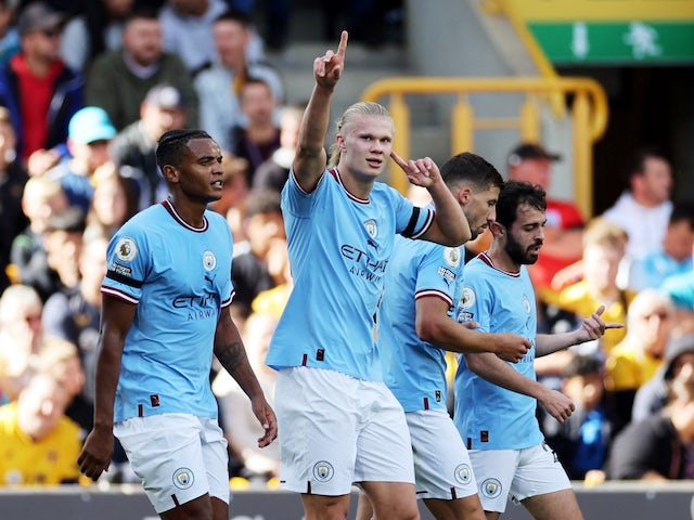 Manchester City's Erling Braut Haaland celebrates scoring their second goal with teammates on September 17, 2022