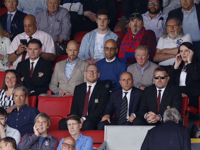 New Manchester United manager Erik ten Hag, Mitchell van der Gaag, director of football John Murtough, Steve McClaren and chief executive officer Richard Arnold in the stands on May 22, 2022