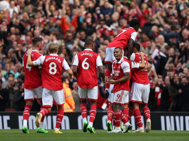 Thomas Partey celebrates scoring for Arsenal against Tottenham Hotspur on October 1, 2022