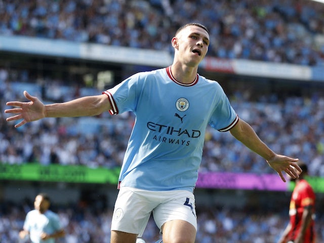 Phil Foden celebrates scoring for Manchester City on August 13, 2022