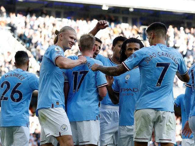Manchester City's Erling Braut Haaland celebrates scoring their fourth goal with teammates on October 8, 2022