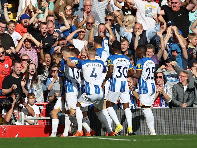 Brighton & Hove Albion's Leandro Trossard celebrates scoring their first goal with teammates on October 1, 2022