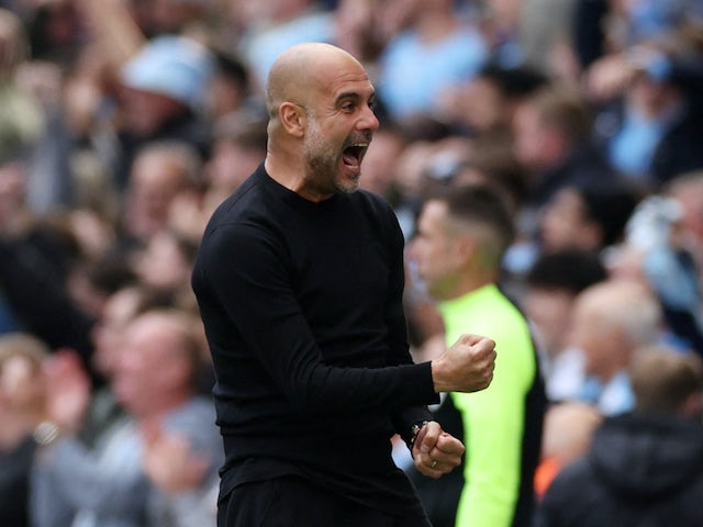 Manchester City manager Pep Guardiola celebrates their third goal on October 2, 2022